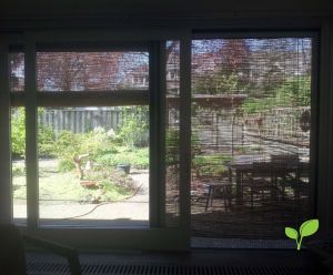 Zonwering gepeld riet met katrolsysteem