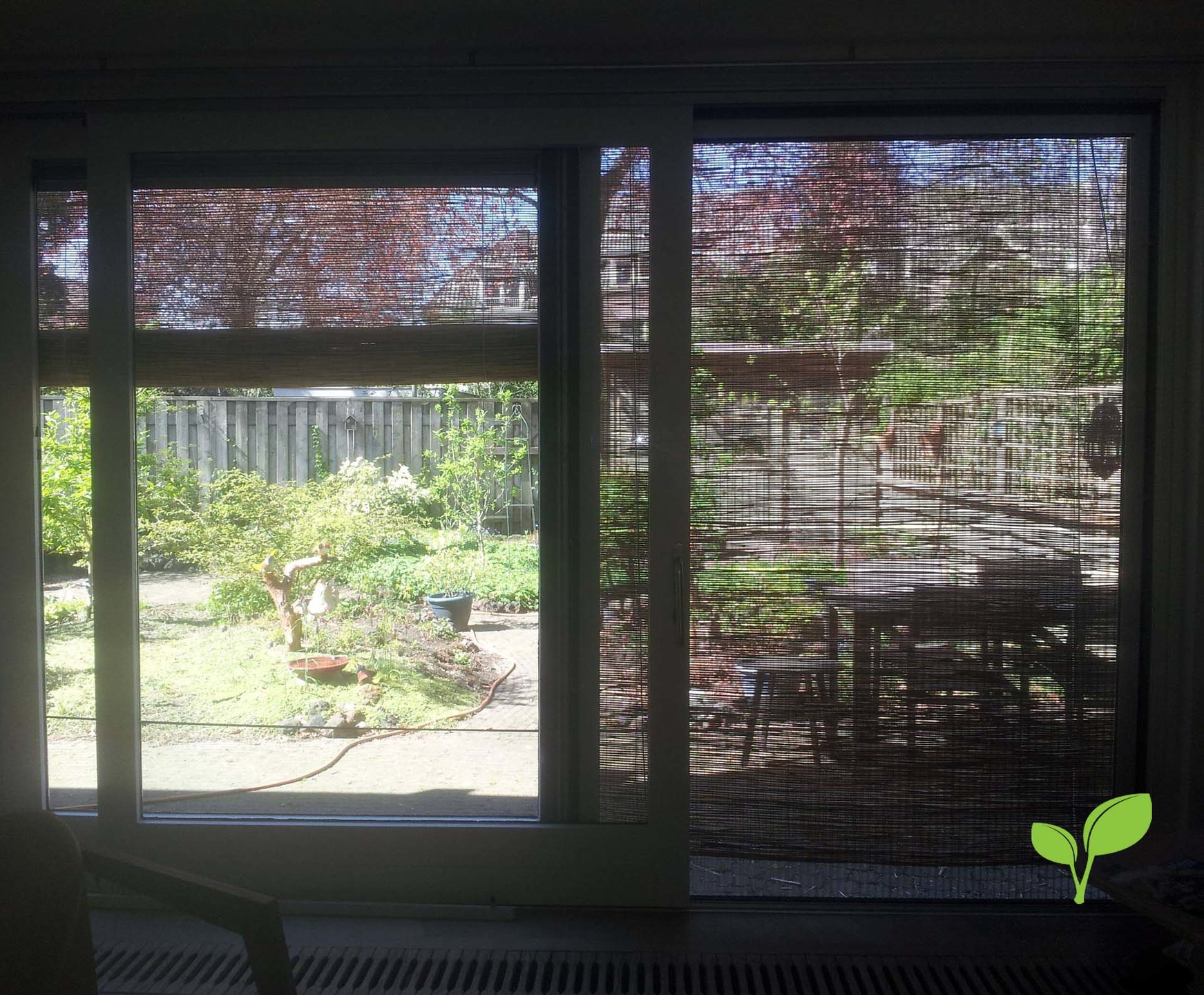 Zonwering gepeld riet met katrolsysteem